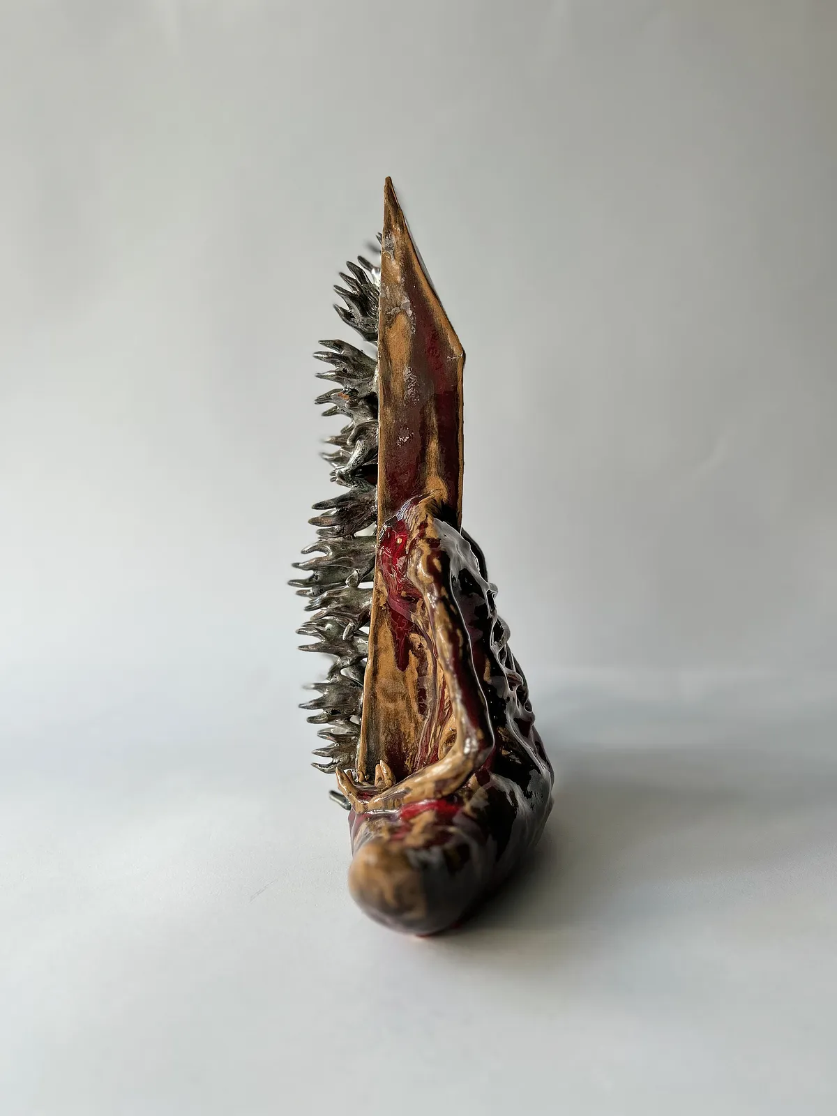 Image of Fear by VITALIY KRASUTSKIY, made of Chamotte clay, ceramic glazes, plaster, acrylic, Sculpture medium, from Lviv, part of the Series 1 series Photo 4 of 10.